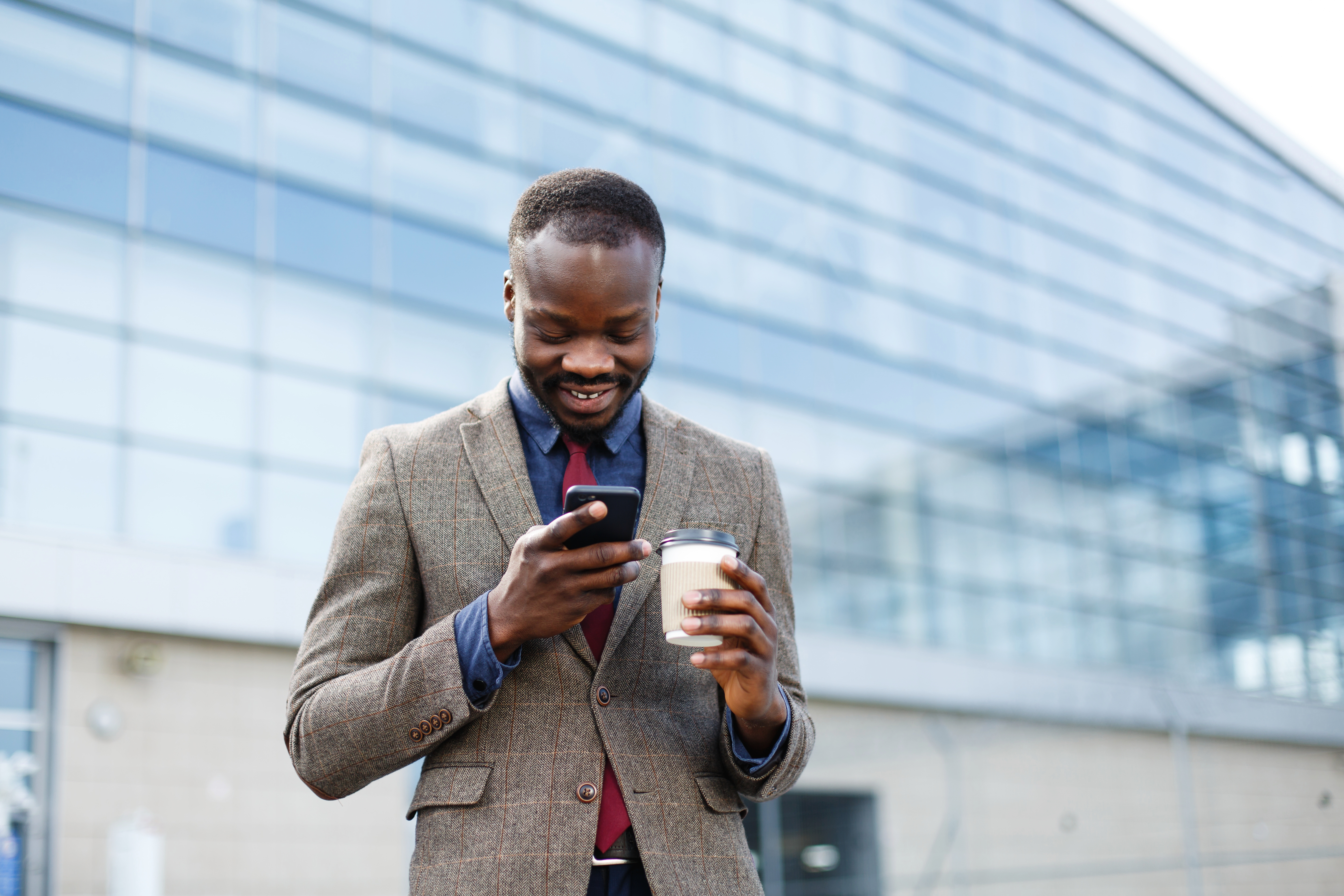 African man with phone